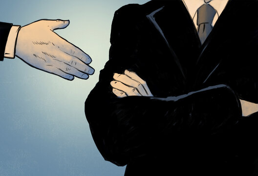 Businessman snubbing offer of handshake