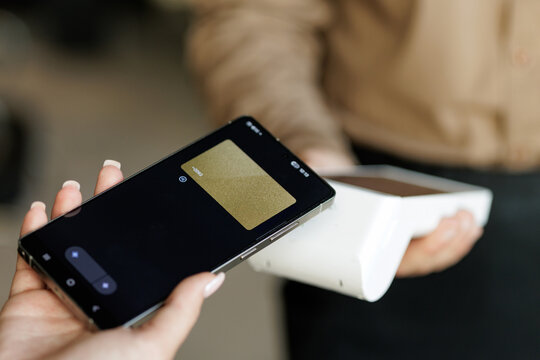 NFC mobile payment with smartphone at wireless POS terminal