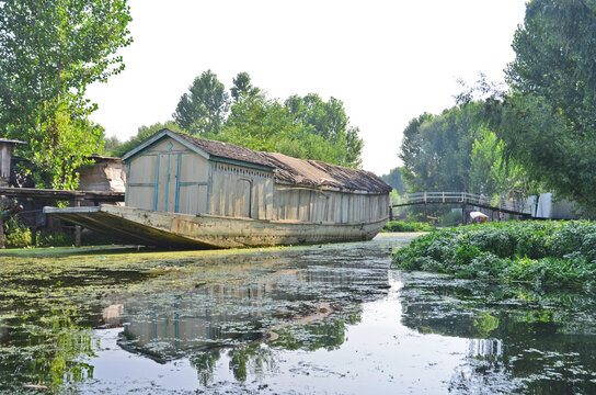 Kasmir with Dal freshwater lake in the city of Srinagar with Houseboats and shikaras on the lake, India