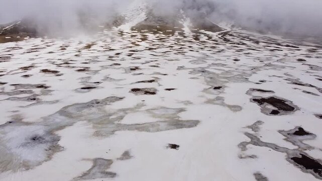 Aerial view of Campocatino ski resort in winter fog, Italy