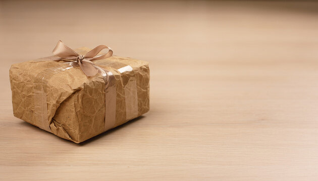 Imperfectly Wrapped Christmas Gift with Crooked Bow