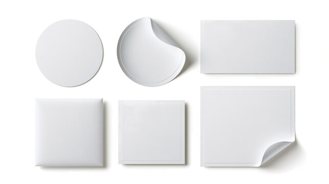  mockup of an organized set of blank matte white stickers on a transparent background. 