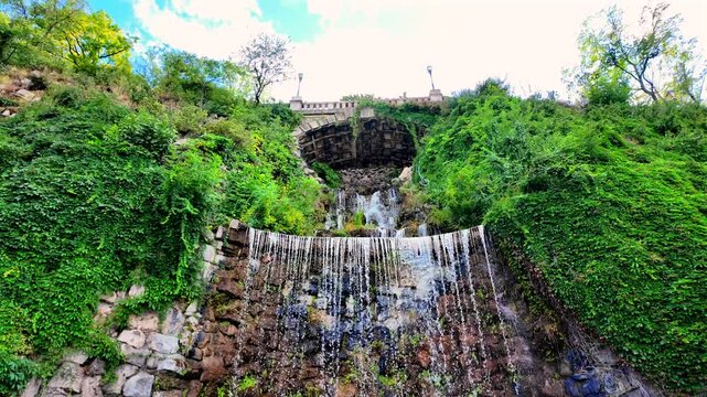 Gellert Hill Waterfall in Budapest with Lush Greenery