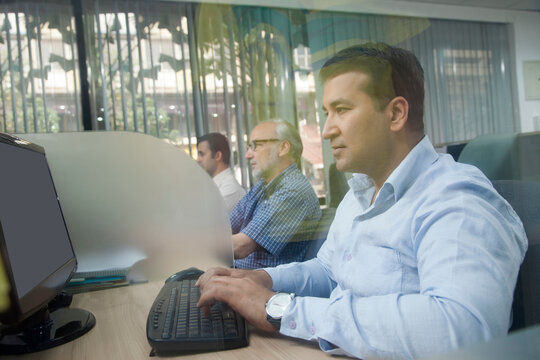 Male executive working on computer