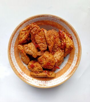 High angle shot of delicious Tahu Balado in a patterned ceramic bowl