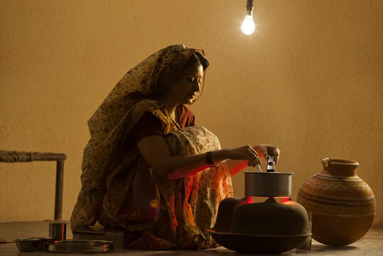 Rural woman cooking food