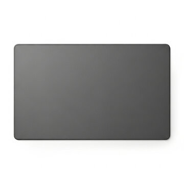 Top view of a rectangular dark grey desk mat or mouse pad isolated on white background