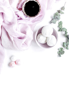 sweet lunch with marsh-mallow and spring flowers for woman on white background top view mockup
