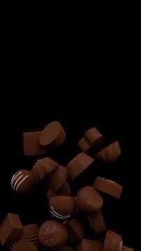 Falling chocolate candy transition &ndash; 3d render with alpha channel.