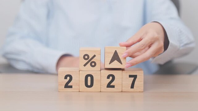 2027 New year with change to UP and Down arrow. Interest rate, GDP, stocks market, financial, deflation and Inflation, mortgage, debt, Loan and Economic Recession