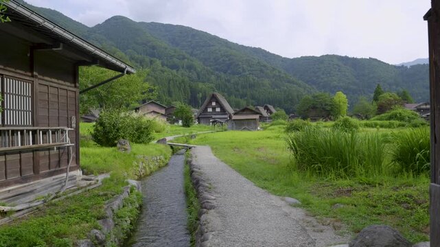 Perfect traditional Japanese scenery at Shirakawa-go in summer with river