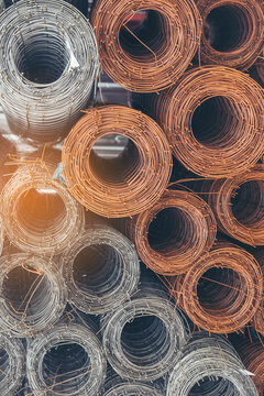 Vertical Roll wire mesh rolls steel production. Roll wire mesh rolls construction material. Iron metal sheets galvanized steel Industry. Vertical Industrial technology manufacturing supply chain