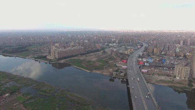Cairo Nile River Highway Bridge Traffic Egypt Aerial View City Skyline Forward Flyover Cinematic Drone Footage DJI Raw Not Color Graded
