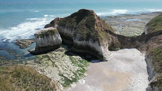 Drone push in view of The Drinking Dinosaur chalk rock at Flamborough, England