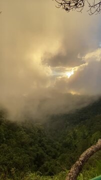 Sunset view over misty mountains at Phu Soi Dao National Park