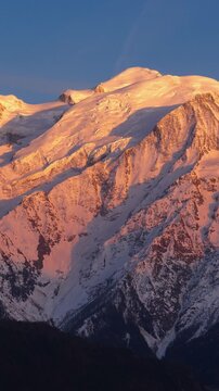 Timelapse of Mont Blanc Massif and glaciers from sunset to twilight. Chamonix, Haute-Savoie, French Alps, France