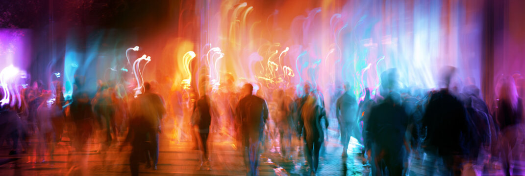 chaotic city movement with abstract motion at night, abstract urban nightlife with people and city lights, dynamic night city crowd with motion and colorful lights