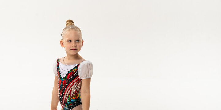 Portrait of child with cochlear implant during dance practice in studio. Banner with copy space. Hearing loss treatment, auditory rehabilitation, assistive medical device, emotional adaptation, and