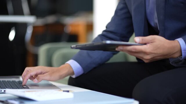 Man use the keyboard for laptop for mobile payments omni channel online shopping.