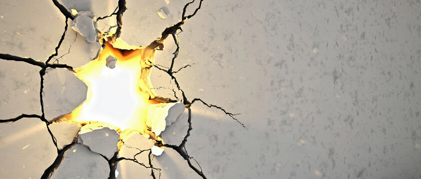 Broken concrete wall with bright light and cracks