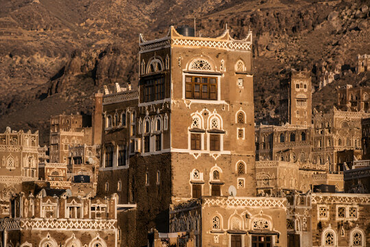 Traditional Yemeni Tower House With White Gypsum Window Trim
