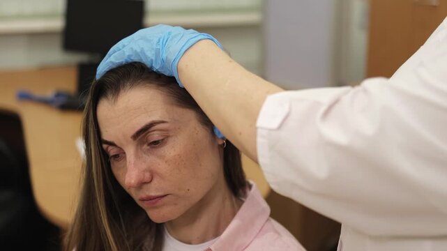 ENT doctor. ears. doctor in a white coat. slow motion video. High quality 4k footage