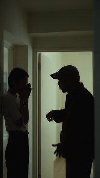 Married couple arguing at home over relationship challenges and daily life pressures. Communication problems, emotional distance, financial stress, mental wellbeing and family relationship concept.
