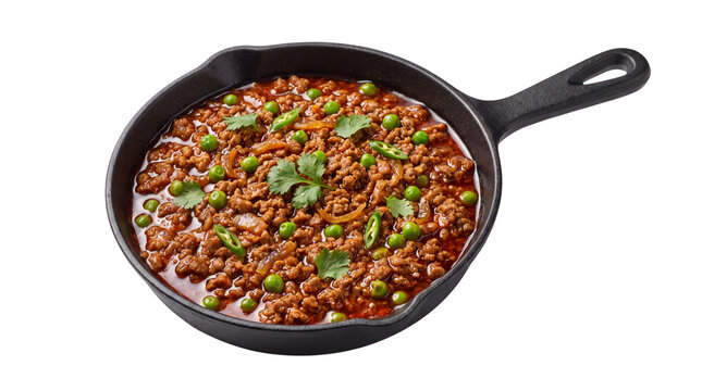 Traditional keema matar in cast iron skillet, spicy minced meat curry with green peas, savory indian beef or lamb dish isolated PNG with Transparent Background