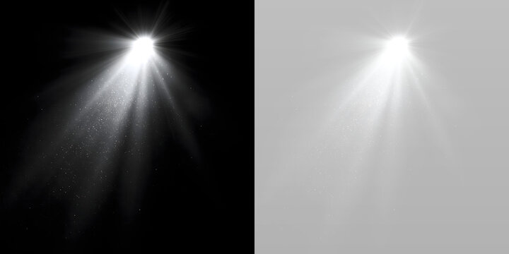 Bright spotlight with sparkling particles and dramatic white light rays.