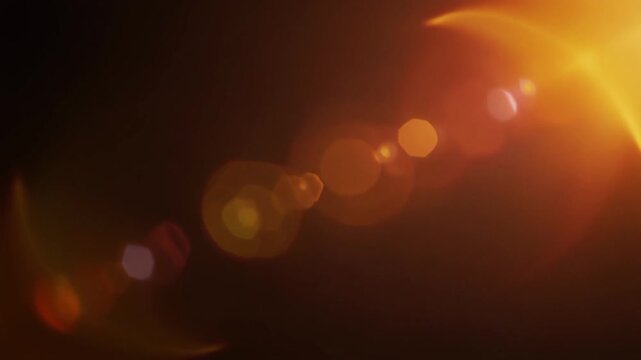 Amber honey light leak drifting across deep black space