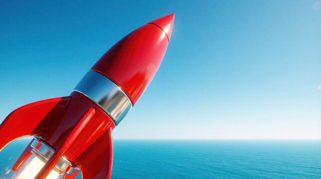 Red rocket blasts off over blue ocean sea towards clear sky. Symbolizes business startup success, growth ambition, innovation, and future exploration. Pure imagination and creative journey.