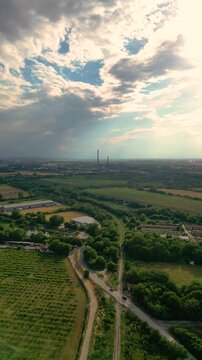 Vertical Aerial View of Rural Landscape and Railway near Plovdiv under Dramatic Sun Rays, Bulgaria