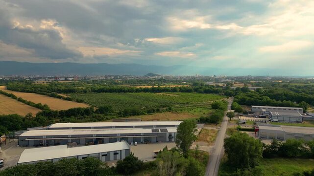 Aerial View of Farmland, Industrial Outskirts and Plovdiv Skyline beneath Dramatic Sky, Bulgaria