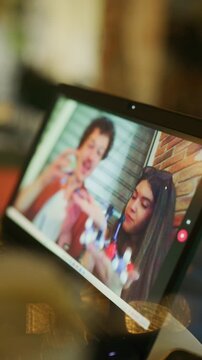Students participate in a virtual chemistry class, showcasing molecular models during an online video call. The young learners demonstrate their understanding of science concepts remotely.