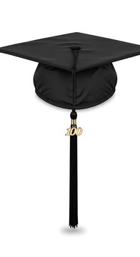 Black graduation cap with tassel on pole