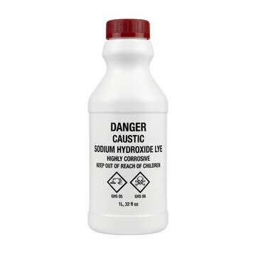 Bottle of sodium hydroxide lye with danger and corrosive warning labels