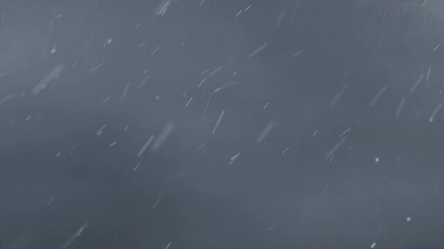 Falling wind-driven precipitation moving diagonally across dark overcast sky, driven by steady wind