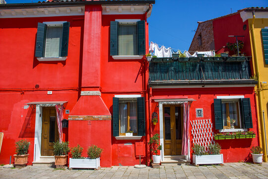 colorful houses on Burano island, near Venice, Italy - sunny day