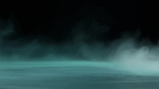 Cool mint fog rolls slowly across dark surface, gentle billows continuously shifting under soft backlighting with calm serene atmosphere, subtle glow, and cinematic depth.