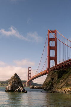 The iconic Golden Gate Bridge main tower from the Fort Baker shoreline