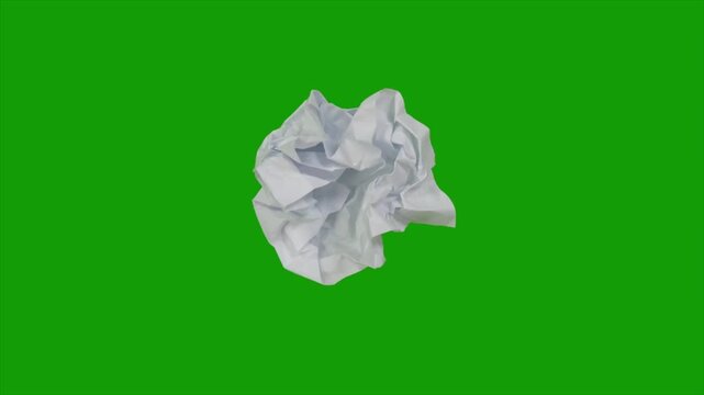 Crumpled white paper isolated on green screen, wrinkled tissue sheet animation, waste and recycling concept, chroma key overlay, 4k stock footage