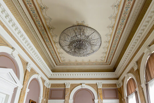 Grand Palace Hall Interior with Large Crystal Chandelier and Ornate Neoclassical Painted Ceiling, Luxurious Historic Architecture and Decor