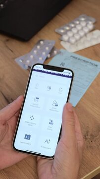Woman using mobile phone and electronic prescription app to order and buy pills. Vertical image. Telehealth e-prescription process for digital pharmacy