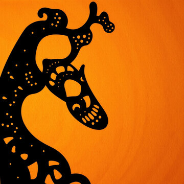 Indonesian shadow puppet wayang kulit silhouette on orange
