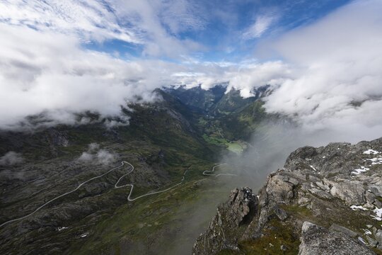 Famous curvy mountain road Fylkesvei 63 or Geirangervegen, which leads from Geiranger to the Djupvasshytta plateau, view of the Geiranger fjord from the 1476 meter high mountain peak and viewpoint Dalsnibba, Stranda, M&oslash;re og Romdal, Norway