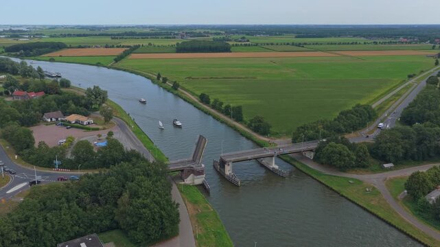 Spannenburger bridge opening for boats cruising canal