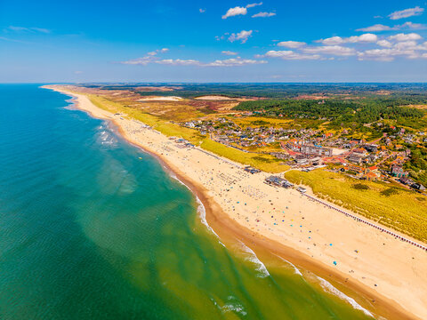 High Angle Drone Point of View on the Coastline of Bergen aan Zee, North Holland, Netherlands on summer day in August