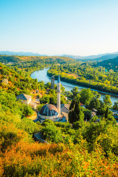 Pocitelj and the Neretva river, featuring Ottoman architecture and the medieval fortress, Gavrakapetan Tower, Bosnia and Herzegovina.