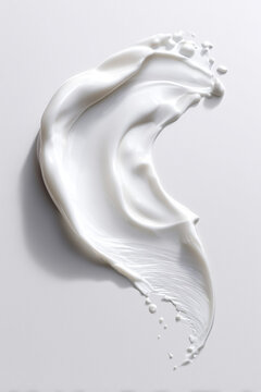 White creamy beauty product testing creating a fluid swirl texture on a clean background, portraying skincare and cosmetic concepts