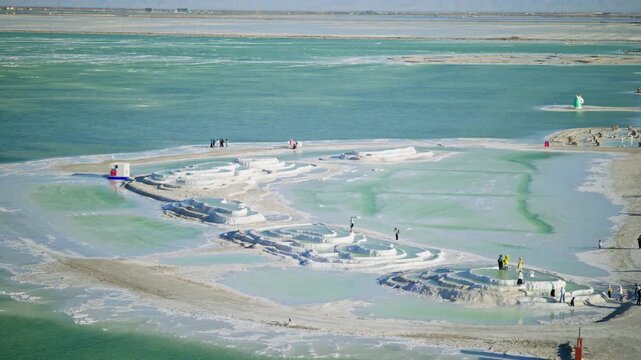 Aerial View of Bishui Yaotai Formation in Qarhan Salt Lake: Emerald Green Water, Sunset Glow and White Salt Crust in Qinghai